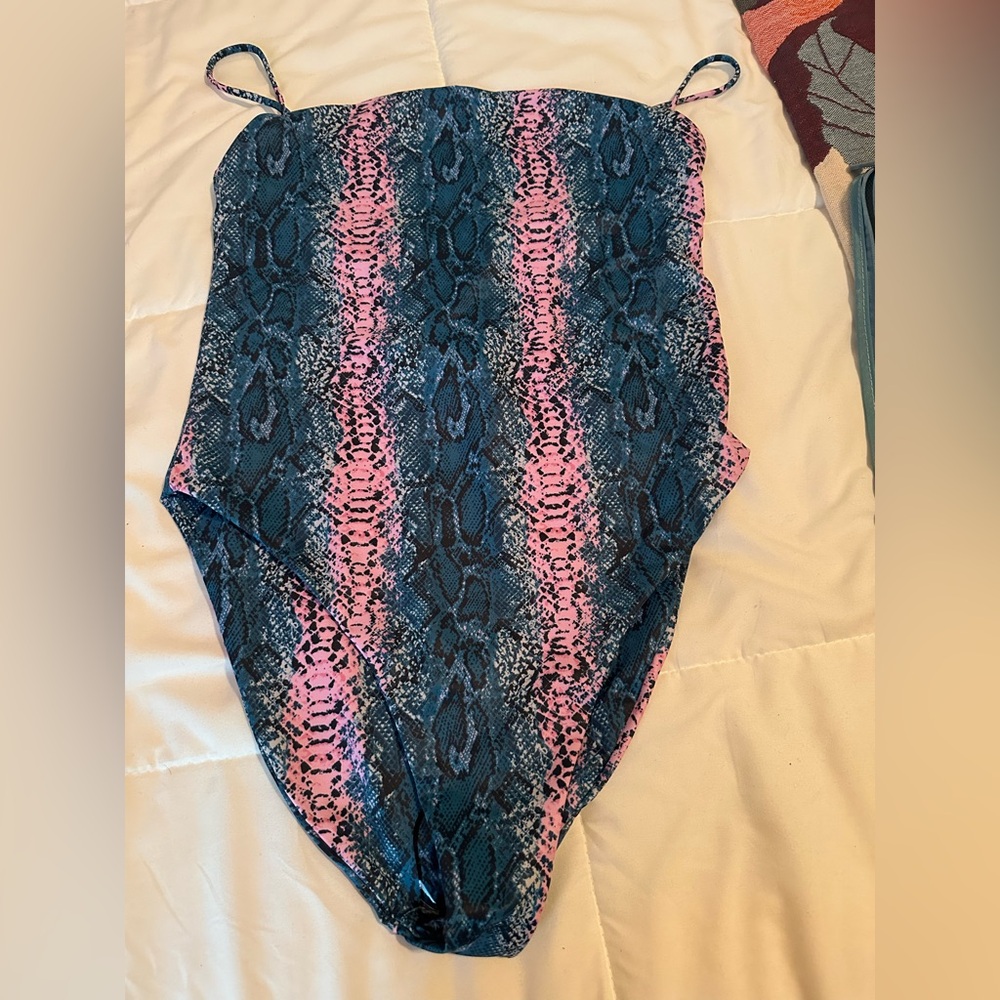 Buddy Love large swimsuit. New with tags. Pink and blue snake print.